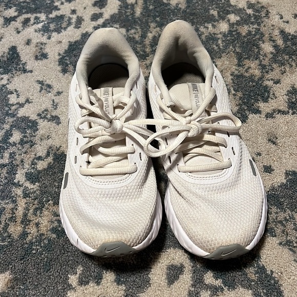 Nike Women’s Tanjun Revolution sneaker - Picture 2 of 4